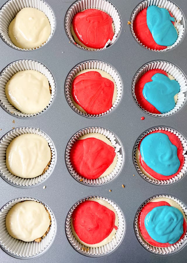 overhead image of adding cheesecake batter to a cupcake pan